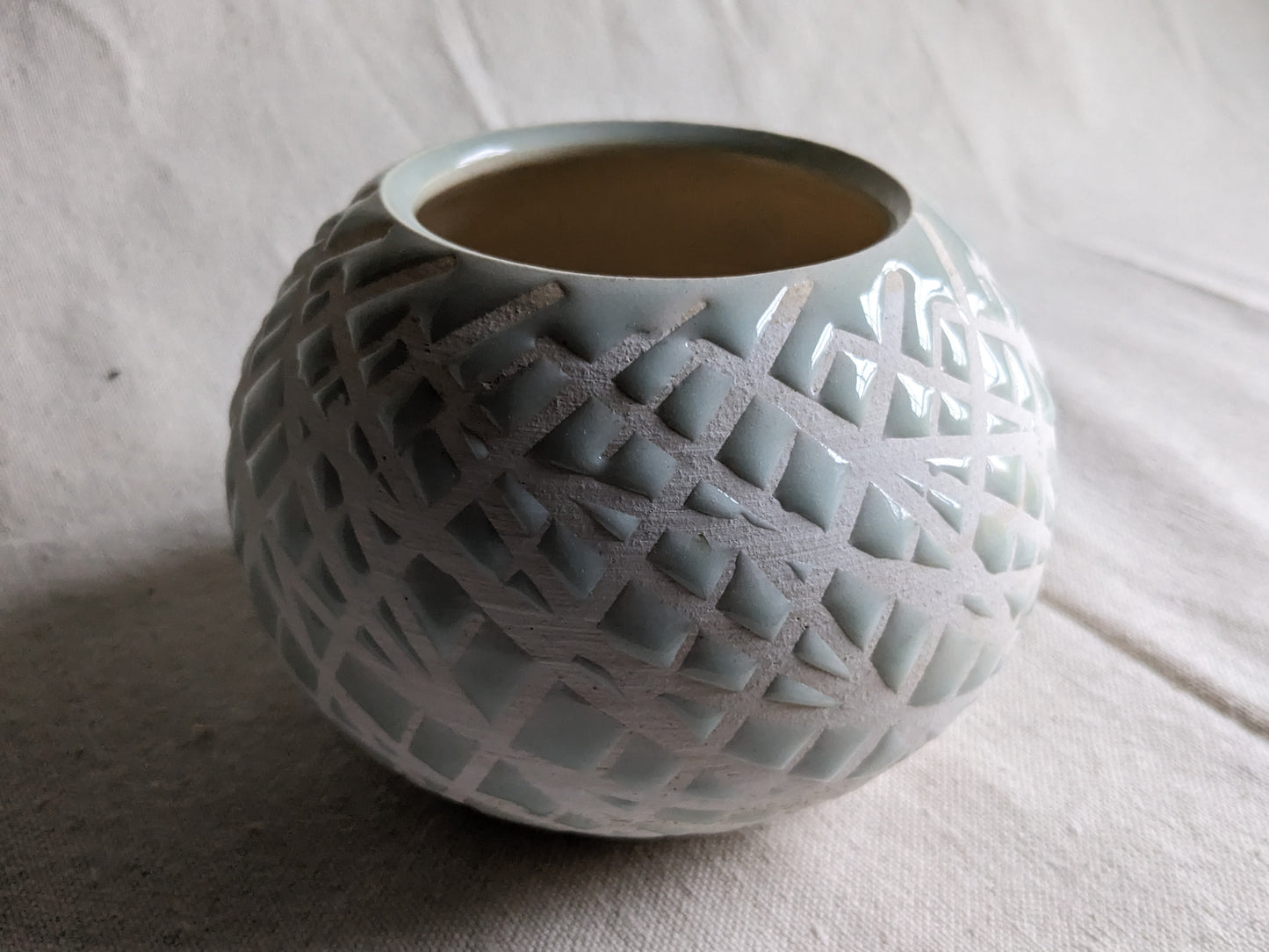 Caffeinated Spider 4.5" Tall Aqua Celadon Vase (in-person pickup only)