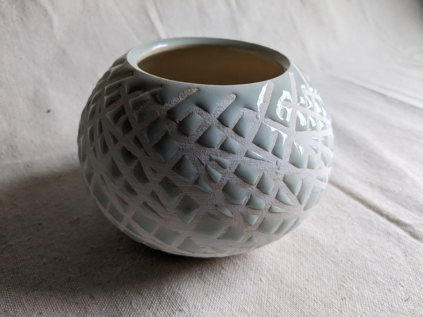 Caffeinated Spider 4.5" Tall Aqua Celadon Vase (in-person pickup only)