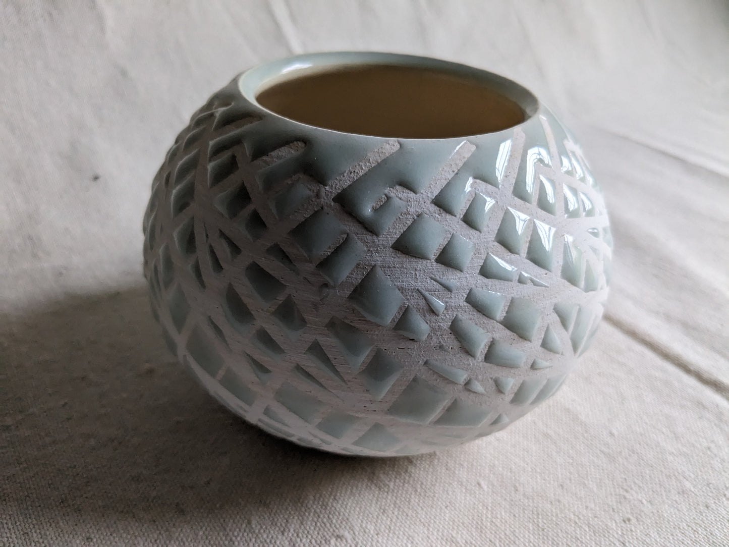 Caffeinated Spider 4.5" Tall Aqua Celadon Vase (in-person pickup only)